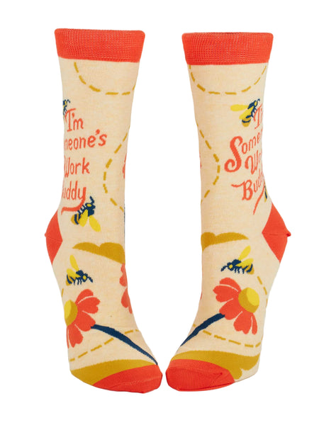 Pair of socks with floral design and text on a white background