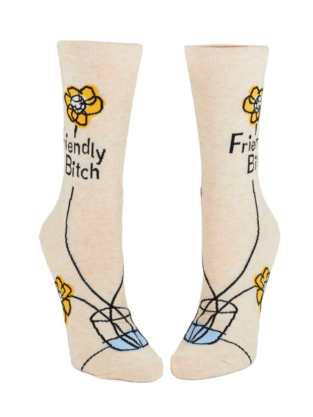 Beige socks with text and flower designs on a white background