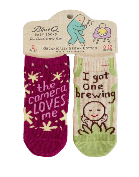 The Camera Loves Me/ I Got One Brewing Baby Socks