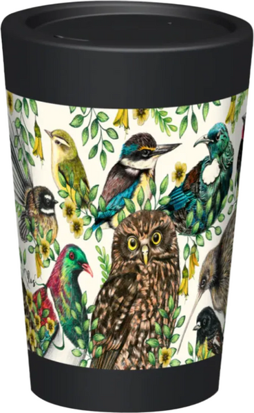 A travel tumbler with a black lid and black top/bottom bands, featuring a detailed bird illustration print on the body. The print shows multiple colorful birds perched among green leaves on a cream background.
