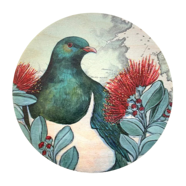 Decorative plate with a green bird and red flowers on a white background