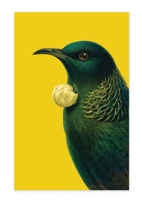 Bright Tui tea towel on a yellow ground